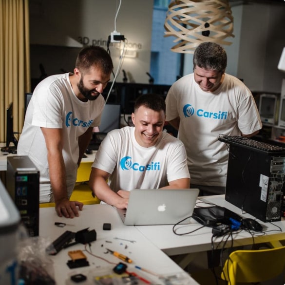 Casifi Wireless Android Auto adapter team in developing process in office places.