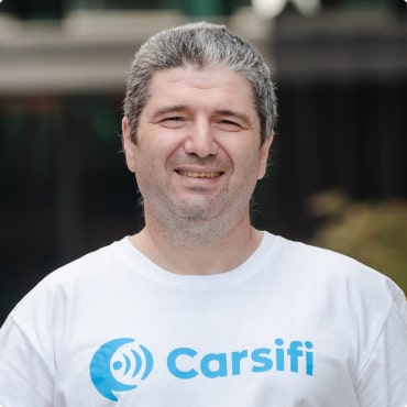Hardware engineer of Carsifi Wireless Android Auto team photo.